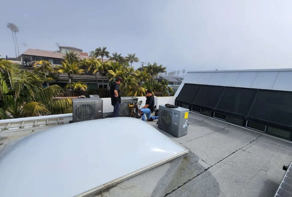 Two HVAC technicians from Smith & Sons Heating and Air performing air conditioning and heating system repairs, illustrat